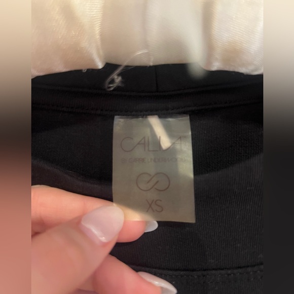 CALIA black sweatshirt with subtle bell sleeves - Picture 3 of 4